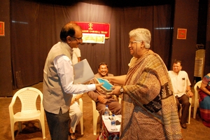 Presenting the 'Bala Mandir Key' to Mr.N.L Rajah,Advocate